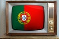 Old tube vintage tv with portugal national flag on screen, television eternal values Ã¢â¬â¹Ã¢â¬â¹concept, global world trade, politics,